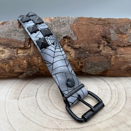 real-leather-belt-with-spider-web-design-and-black-pyramid-studs