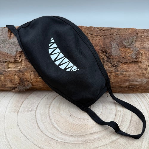 black-face-mask-with-a-pumpkin-grin-for-halloween