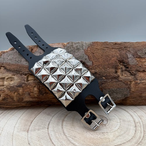 real-black-leather-wristband-with-four-rows-of-silver-pyramid-studs-for-heavy-metal-fans