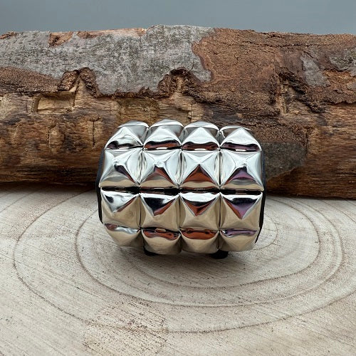 real-black-leather-wristband-with-four-rows-of-silver-pyramid-studs-for-heavy-metal-fans