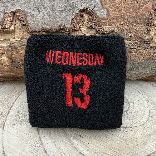 sweatband-wristband-in-black-with-band-wednesday-13-logo-in-red